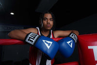 variant:blue::TITLE Boxing USA Boxing Competition Gloves - gloves on rings