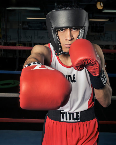 variant:blank black::TITLE Boxing USA Boxing Competition Headgear - Open Face right jab