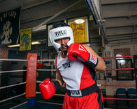 variant:white::Boxer with white headgear with checks