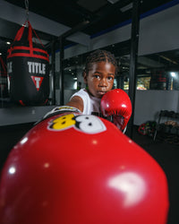 variant:Red/Black/White::BOOM BOOM Boxing Silencer youth bag gloves close up on glove