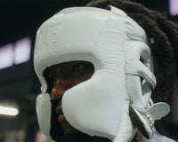 variant:white::TITLE Boxing Pro Sparring Headgear closeup on boxer's head side view