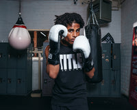 variant:black/white::TITLE Boxing Rush training gloves boxing pose 