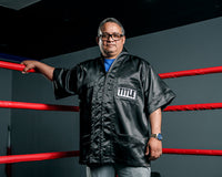 variant:black::TITLE Old School Corner Jacket 2.0 coach on all red ring ropes