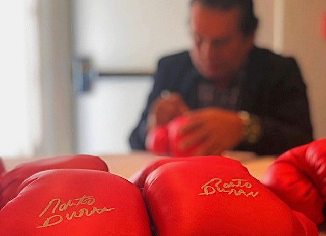 variant:red::TITLE Boxing Legacy Autograph Gloves 2.0 somebody signing the gloves