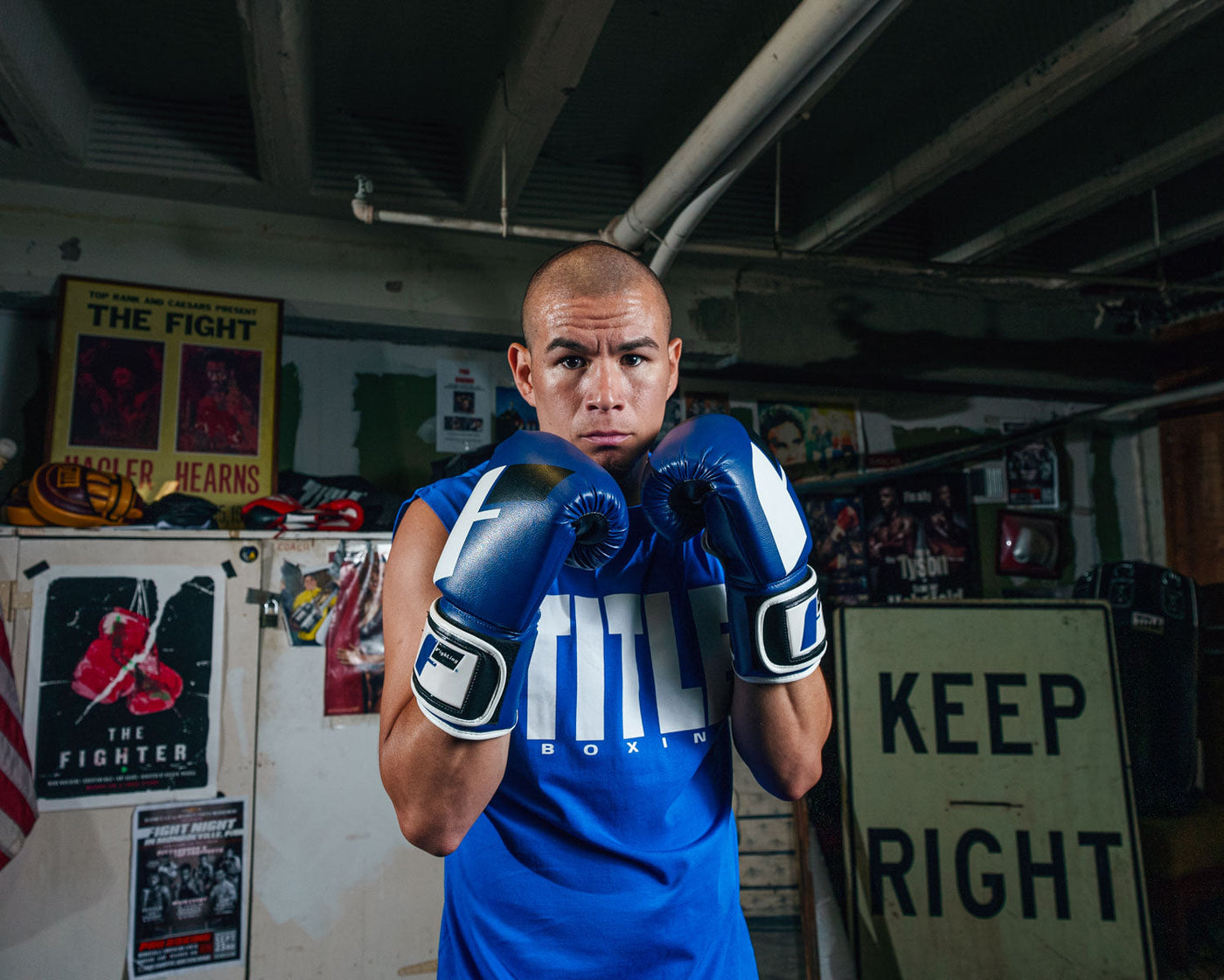 variant:blue/black/white::Fighting Big Logo Boxing Gloves guy boxing stance