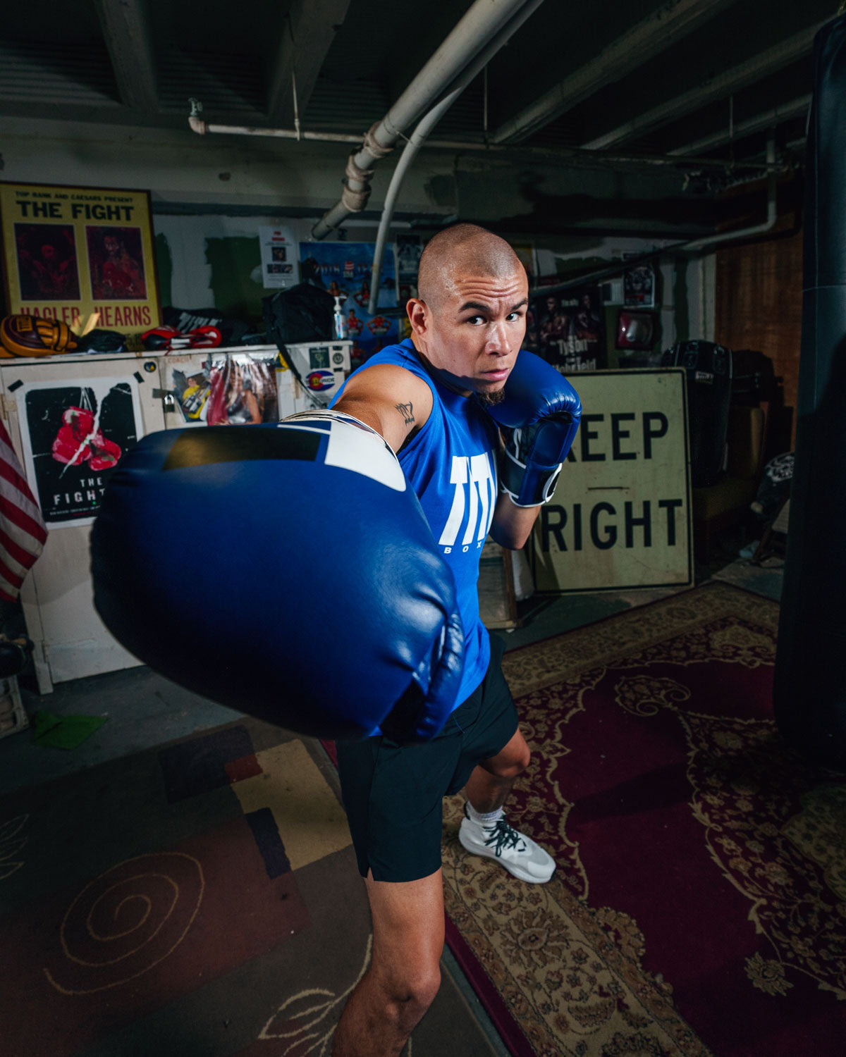 variant:blue/black/white::Fighting Big Logo Boxing Gloves guy standing right jab