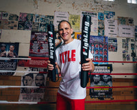 variant:lifestyle::Fighting Combat Striking Sticks sticks hands up with coach 
