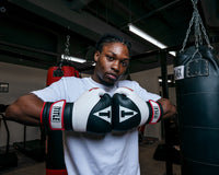 variant:Black/White::TITLE Boxing Gel Suspense Training Gloves boxer hands together