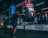 variant:black/gold::Adidas Box Hog 4 Boxing Boots kid hitting ring