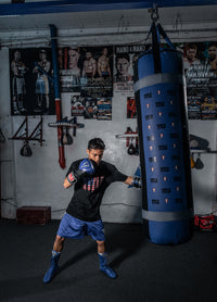 variant:150 lbs::TITLE Boxing Greatest Heavy Bag Ever guy hitting bag