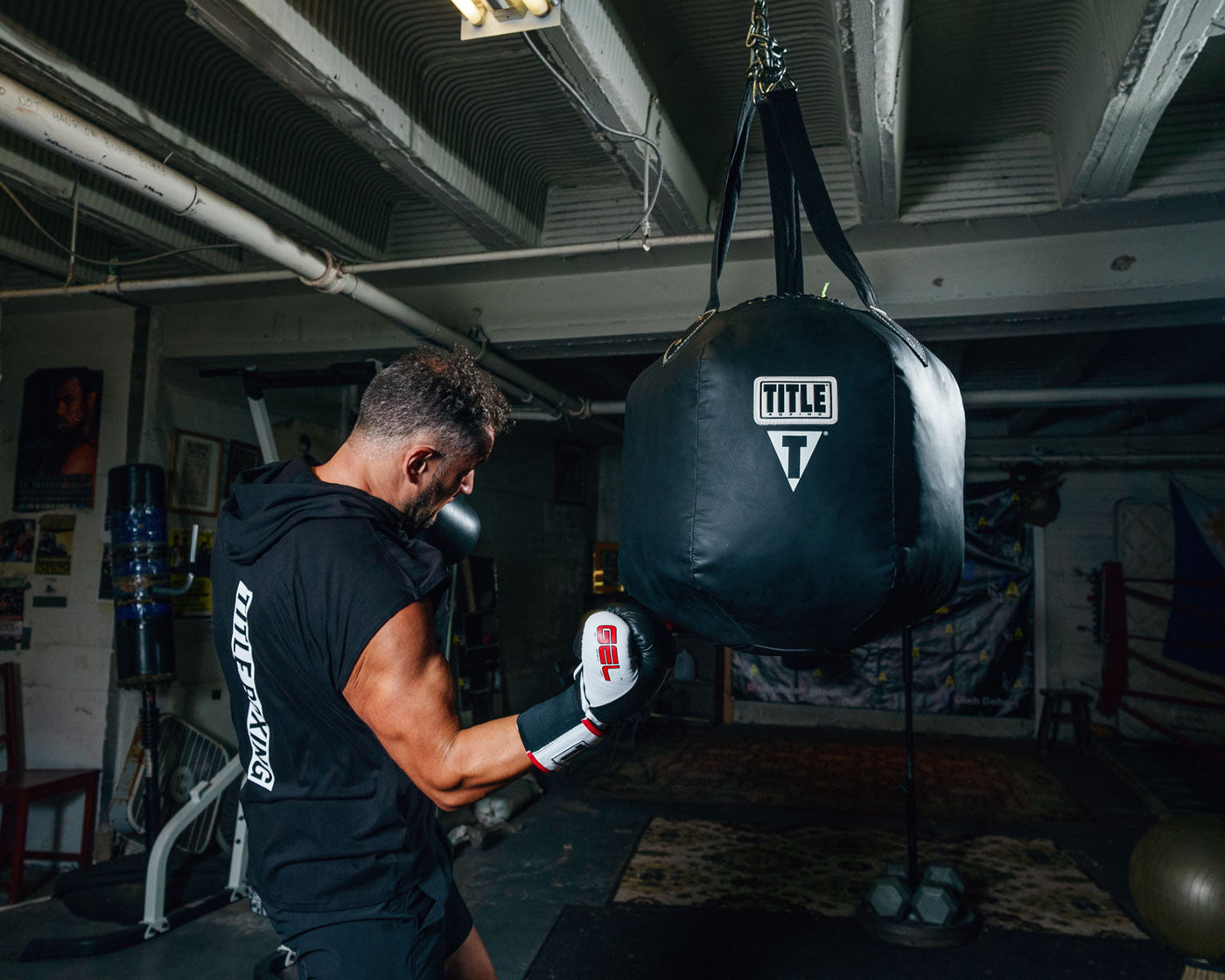 variant:lifestyle::TITLE Boxing Body Snatcher Bag back picture of guy with bag