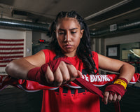 varaint:red::KRONK Boxing Gym Hand Wraps girl putting on wraps