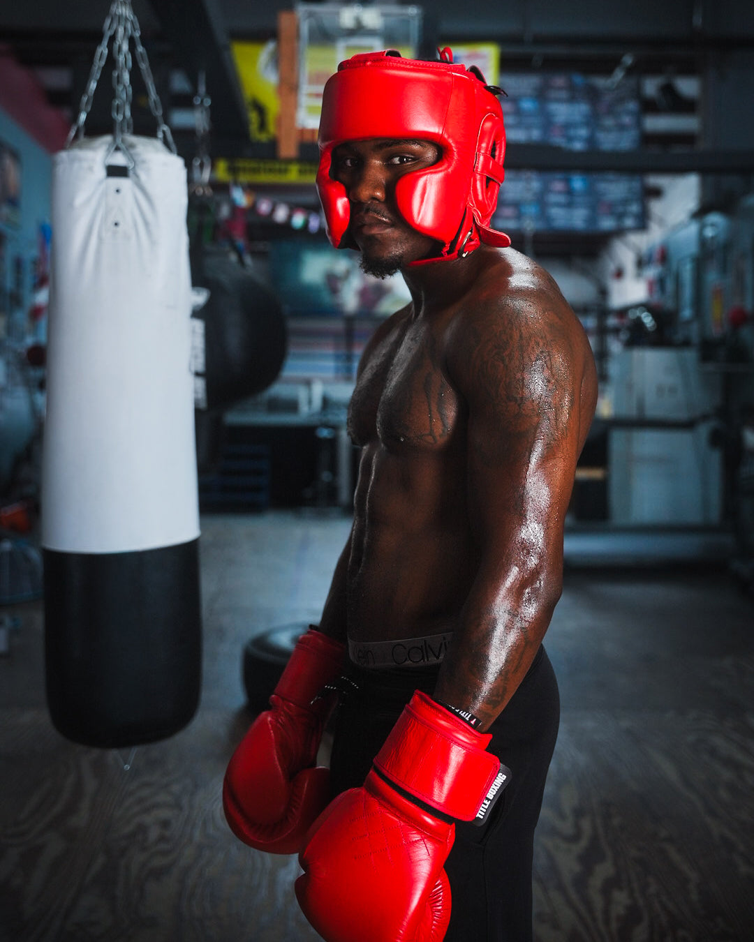 variant:red::TITLE Boxing KO-Vert Stealth Headgear on boxer in the gym
