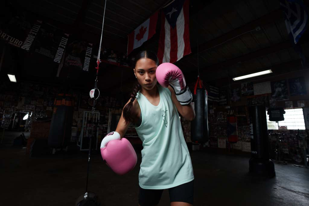 variant:green::TITLE Boxing Current Women's Tank girl with pink gloves boxing stance