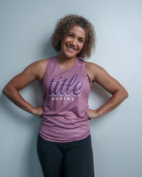 variant:purple::TITLE Boxing Script Racerback Women's Tank woman posing in tank top