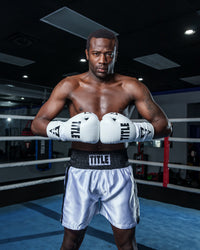 variant:white/black::TITLE Boxing Leather Pro Fight Gloves hands together