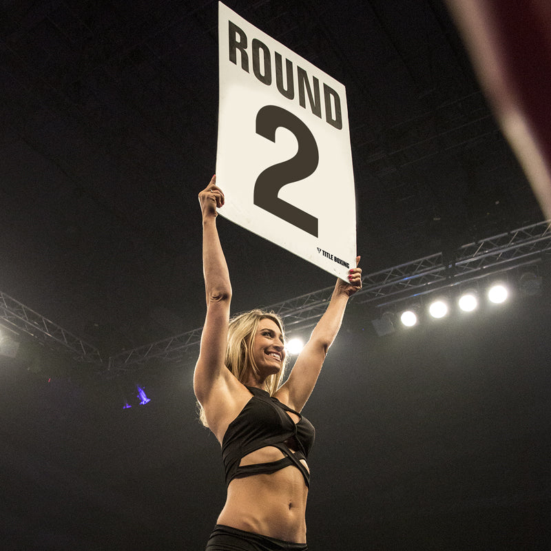 variant:11::TITLE Boxing Jumbo Round Cards girl holding up card in boxing ring