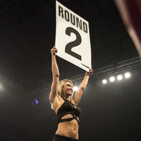 variant:11::TITLE Boxing Jumbo Round Cards girl holding up card in boxing ring