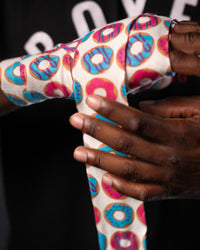 variant:donuts::TITLE Boxing Print Mexican Style 180" Hand Wraps being wrapped on boxer's hands closeup