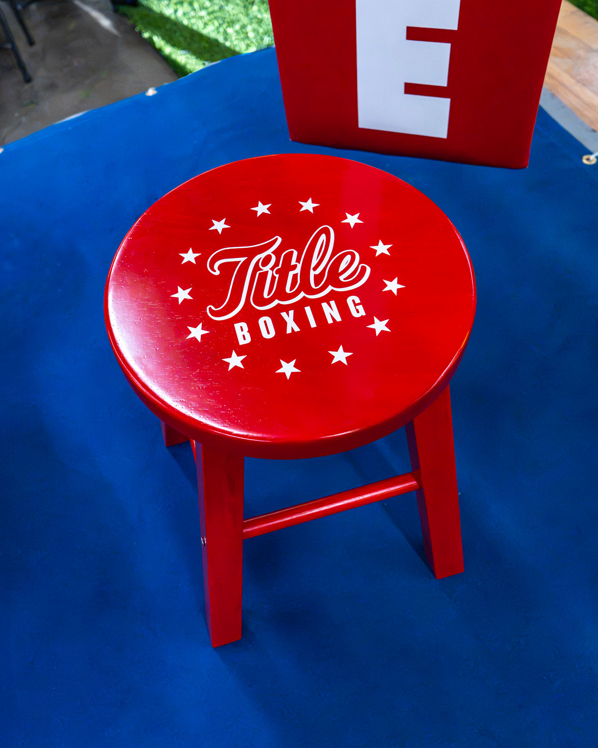 variant:red::TITLE Boxing Ring Stool in corner of ring