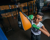 color:8" x 11"::TITLE Boxing Super Speed Bags kid hitting speed bag