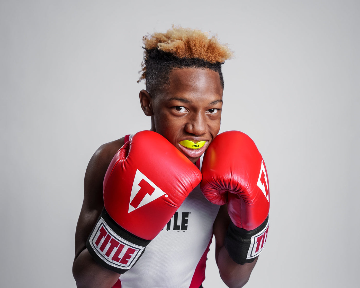 variant:yellow::TITLE Boxing Super Shield X2 Mouth Guard guy wearing mouth guard
