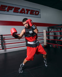 variant:red/black::TITLE Boxing Latitude Amateur Boxing Set kid in ring boxing pose