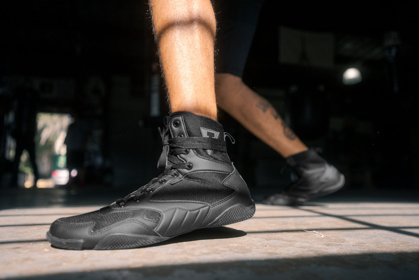 variant:black::TITLE Charged Boxing Shoes up close of black shoe
