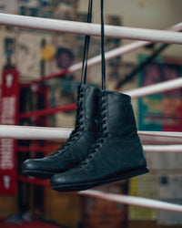 variant:black::TITLE Boxing High-Top Leather Boxing Shoes hanging shoes