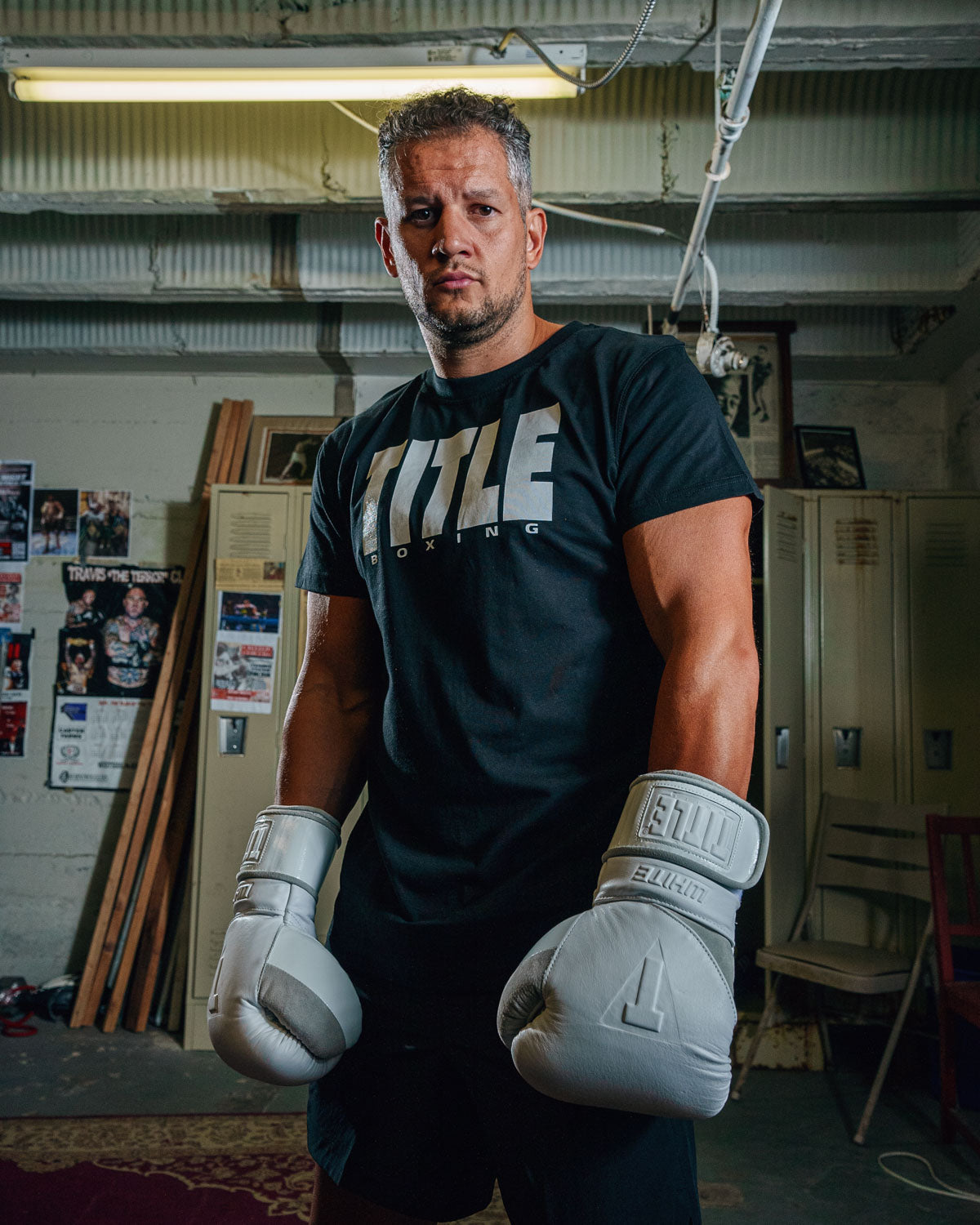 variant:Black/Grey::TITLE Boxing Iconic Block Tee man in tee with gloves