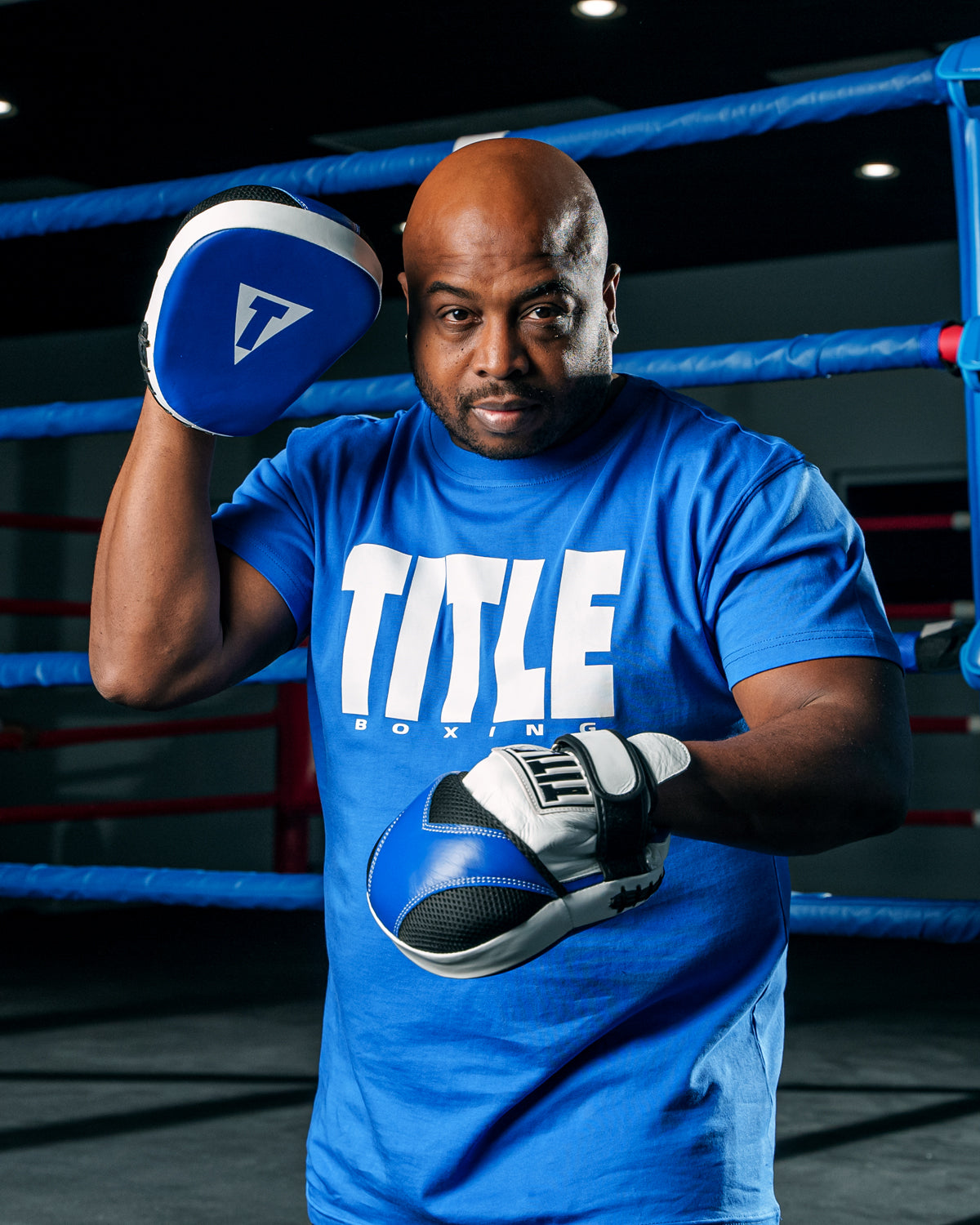 variant:Blue/White::TITLE Boxing Iconic Block Tee man posing in tee