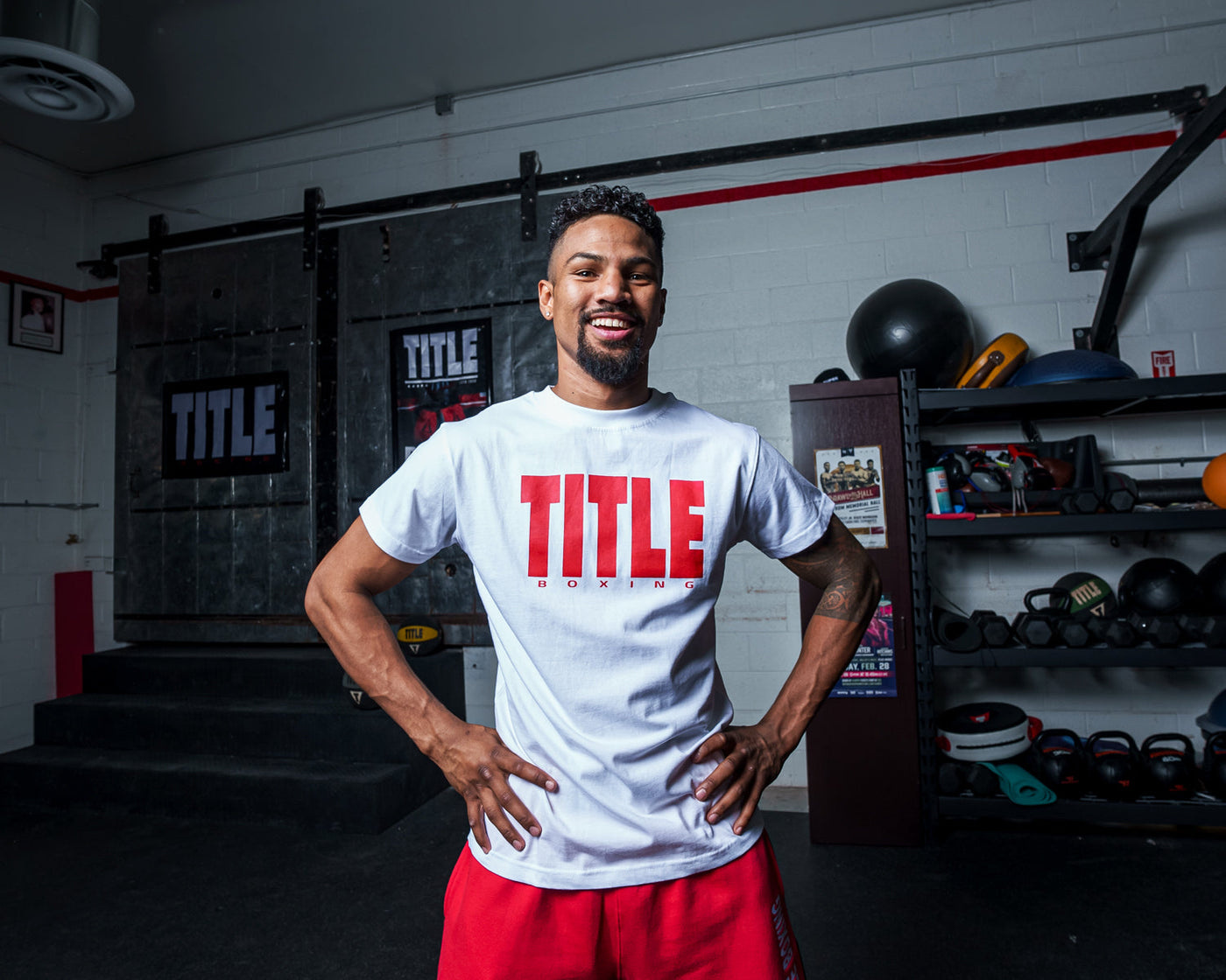 variant:White/Red::TITLE Boxing Iconic Block Tee man posing in tee