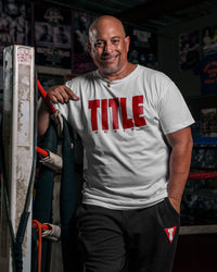 variant:White/Red::TITLE Boxing Iconic Block Tee man posing in tee