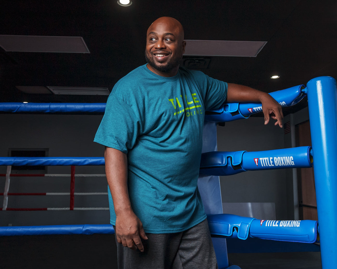 variant:Blue::TITLE Boxing Striped Wordmark Tee