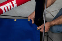 variant:Blue::TITLE Boxing Pro Canvas Ring Covers putting on canvas in blue