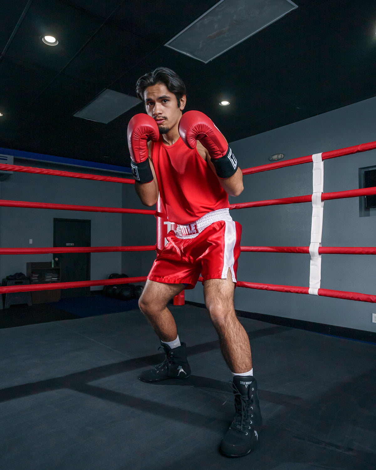 variant:red/white::TITLE Boxing Professional Traditional Cut Trunks guy all red boxing stance