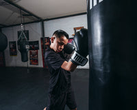 variant:Black/White::TITLE Premier Leather Super Bag Gloves 2.0 uppercut bag