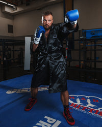 variant:black::TITLE Boxing Stock Full Length Robe 3.0 guy left jab