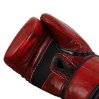 variant:lifestyle::TITLE Boxing Blood Red Leather Bag Gloves palm view