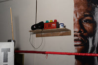 variant:lifestyle::TITLE Classic Pro Gym Timer on a shelf in a boxing gym