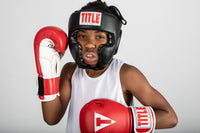 variant:lifestyle::TITLE Classic Traditional Training Headgear 2.0 boxing stance