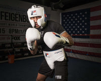 variant:white::Fighting Leather Training Gloves guy posing with gloves