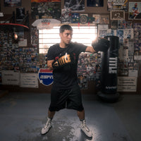 variant:Black/Gold::TITLE Boxing Inferno Intensity Lace Training Gloves left jab