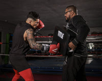 variant:Lifestyle::TITLE Boxing Square Punch and Kick Shield coach right hook