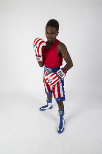 variant:Blue/White::TITLE Boxing Speed-Flex Encore High-Top Shoes boy posing in shoes