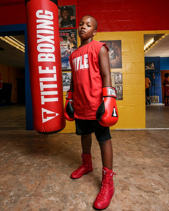 variant:Red::TITLE Boxing Speed-Flex Encore Mid-Top Shoes boy posing in shoes