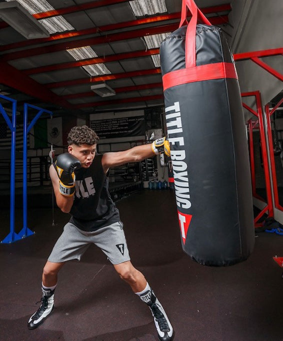 variant:Black/White::TITLE Boxing Speed-Flex Encore High-Top Shoes man boxing in shoes