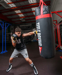variant:Black/White::TITLE Boxing Speed-Flex Encore High-Top Shoes man boxing in shoes
