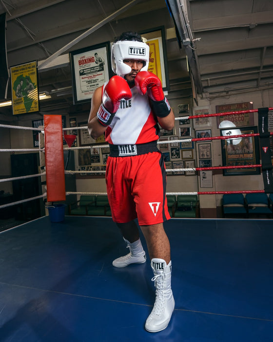 variant:White::TITLE Boxing Speed-Flex Encore High-Top Shoes man posing in shoes