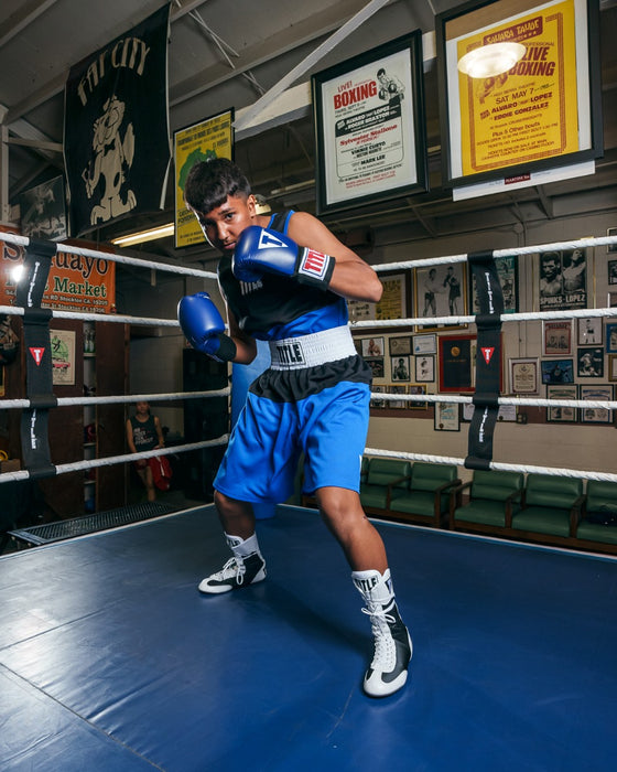 variant:White/Black::TITLE Boxing Speed-Flex Encore High-Top Shoes man posing in rings